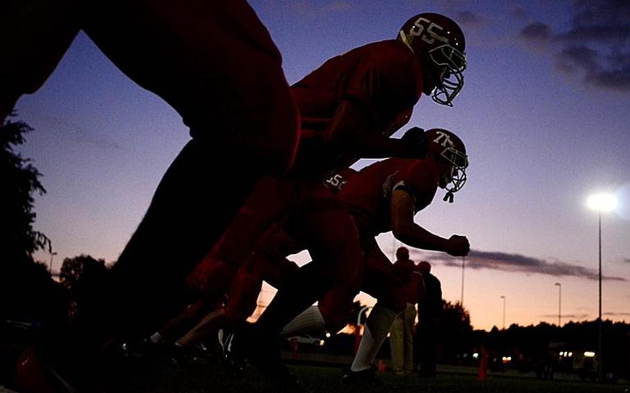 Kaiserslautern linemen run drills before the game.