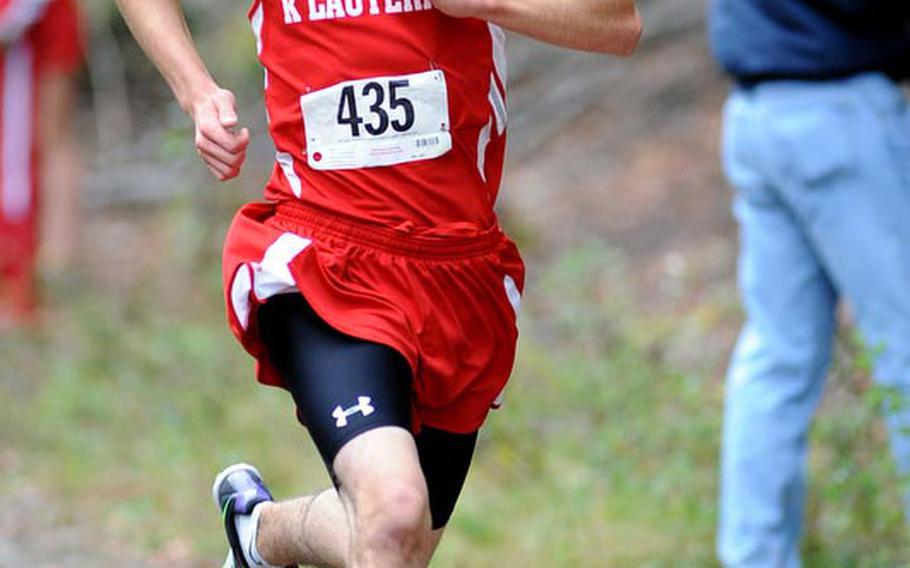 Kaiserslautern's Michael Lawson sprints to the finish line in the boys cross country race in Kaiserslautern on Saturday. He won the race in 16 minutes, 36.4 seconds ahead of Ramstein's Thomas Lambert, and teammate Matt Finley.