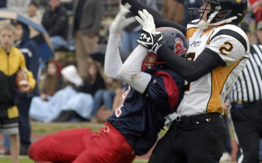 Lakenheath defender Nick Ruiz can't come down with the interception while battling Patch receiver Sean Rittenhouse during a 21-0 loss at home on Saturday. Rittenhouse scored 15 of the Panthers points with two touchdowns and a field goal. He also had 115 yards receiving, two interceptions and seven tackles during the game.