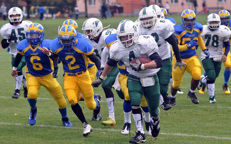 Naples junior Kyle Baldree breaks free from the Ansbach defense Saturday during the Wildcats' 41-40 win over the Cougars.