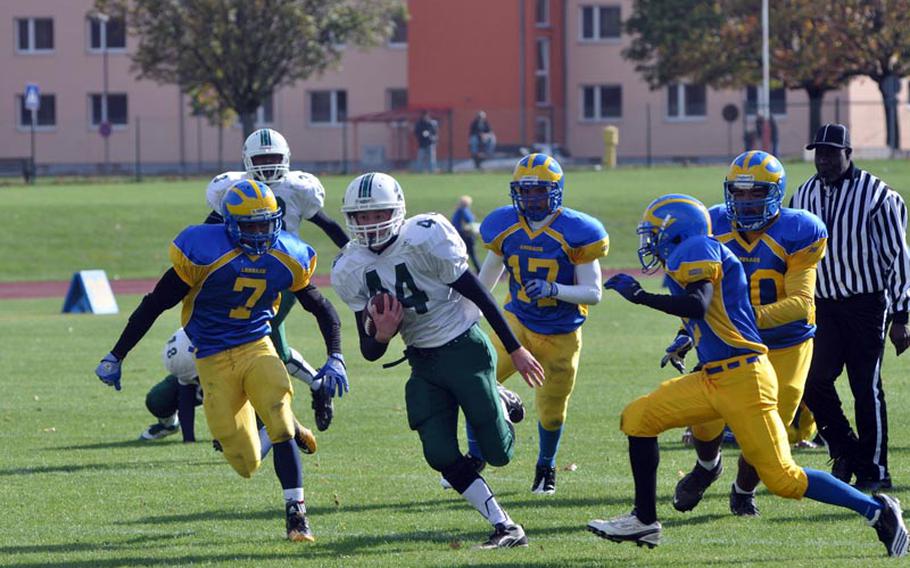 Naples junior Bryan Pfirrmann breaks free from the Ansbach defense Saturday in the Wildcats' 41-40 comeback win over the Cougars. Pfirrmann rushed 20 times for 129 yards for visiting Naples.