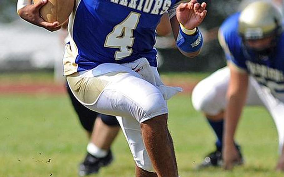 Wiesbaden senior Daniel Harris heads upfield for a big gain in a game against Heidelberg on Sept. 24.