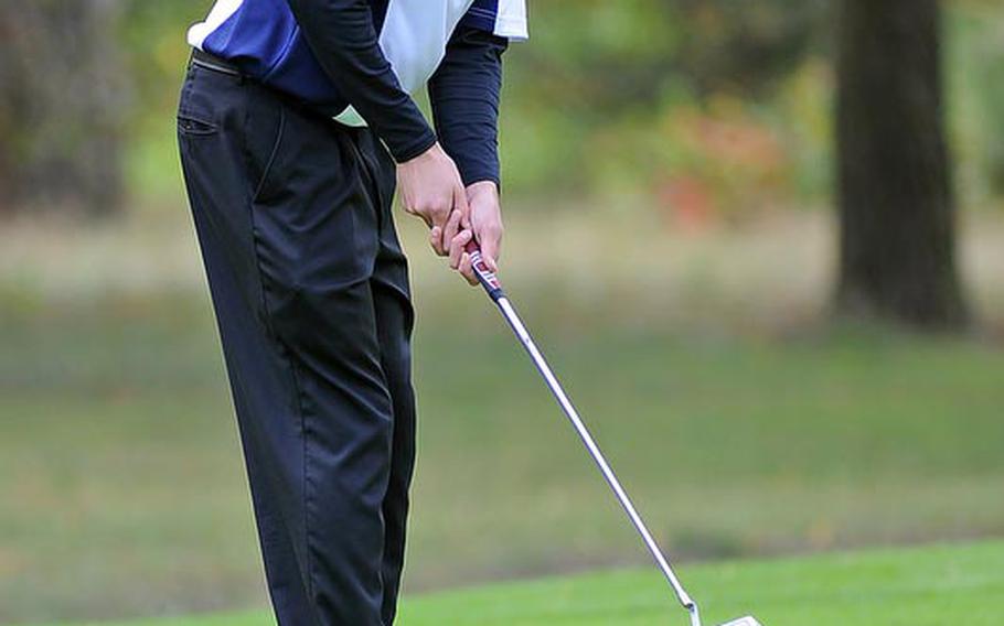 Ramstein's Everett Plocek watches his putt roll towards the cup during opening round action at the DODDS-Europe golf championships at the Heidelberg Golf Club. Plocek is tied for the lead with teammate Lucas Rockwell and SHAPE's Alex Nguyen with a 42, using a modified Stableford scoring system.
