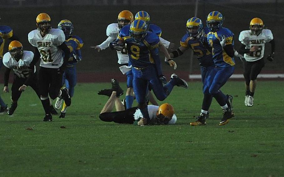 Ansbach senior Xavier Jones breaks free from the SHAPE defense Friday night in Ansbach. Ansbach won the game 66-13. Jones had 259 yards on nine carries and scored four touchdowns on runs of 14, 14, 58 and 86 yards.