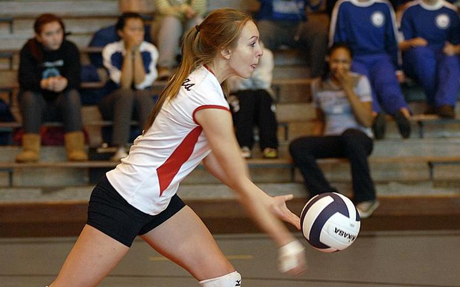 Menwith Hill's Brittany Clays serves the ball during a game against the Lakenheath Lancers on Saturday at RAF Lakenheath, England. The Mustangs defeated the Lancers three games to two games.