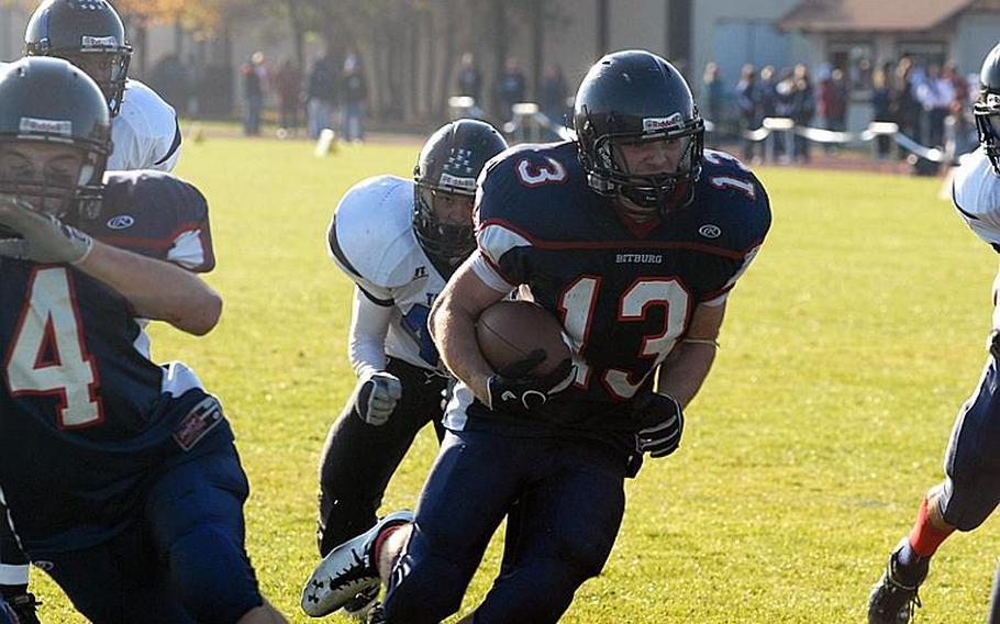 Bitburg junior Kyle Edgar rushes for one of his five touchdowns during Saturday's 44-0 playoff victory over Hohenfels.