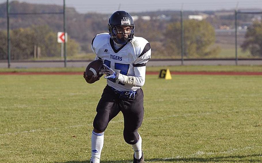 Hohenfels senior Xavier Davis breaks outside during Saturday's Division II quarterfinal matchup against Bitburg.