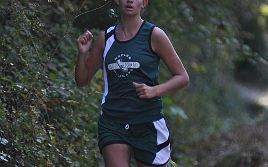 Naples' Amber Shelike finished fourth in a dual meet with Aviano on Saturday, crossing the finish line with a time of 22 minutes, 58 seconds. Her team won by scoring five fewer points than Aviano.