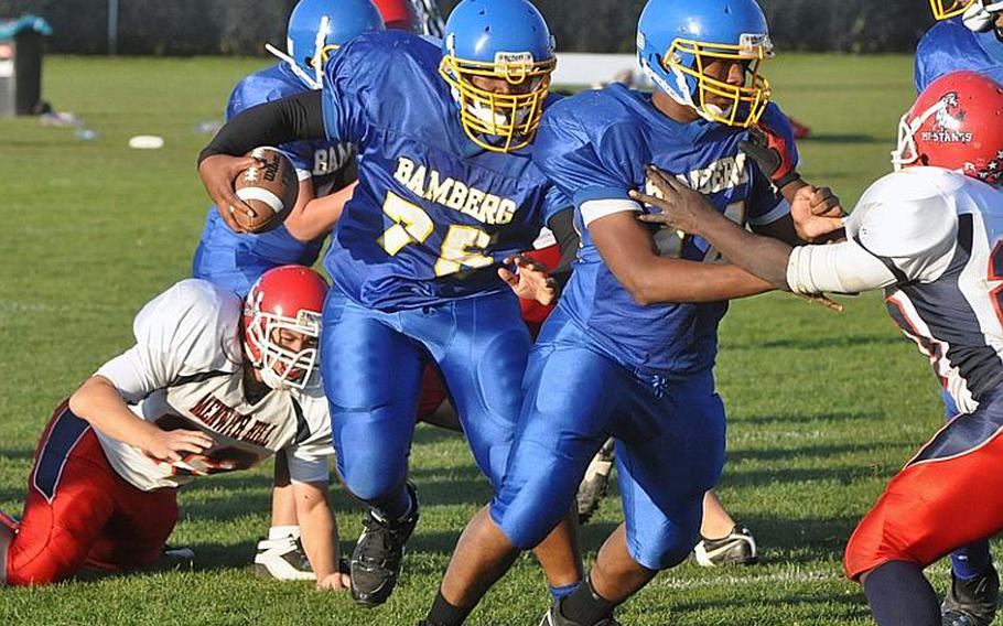 Bamberg sophomore Wally Garcia, a 250-pound fullback/lineman runs in the go ahead score late in the 4th quarter Saturday to give Bamberg a 34-28 lead over visiting Menwith Hill. Bamberg would go onto win the D-III semifinal game 42-28. 
