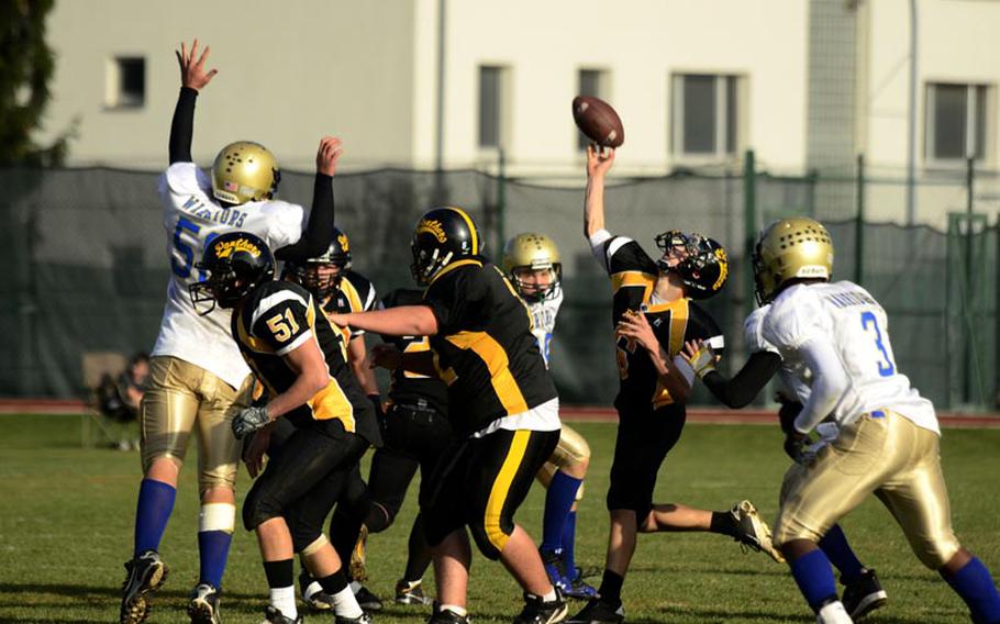 Patch's quarterback, Austin LeMay, throws a pass in Saturday's 21-17 loss to Wiesbaden.