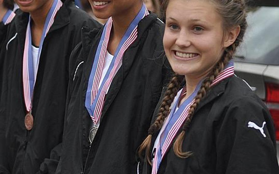 Patch runners,from right to left, Baileigh Sessions, Morgan Mahlock and Julia Lockridge took the top three medals among the girls at the 2011 European Coss Country Championships on Saturday at the Tompkins Barracks training area in the Heidelberg suburb of Schwetzingen. The team won first place in Division I with 20 points, far ahead of rival Ramstein who took second with 83 points.