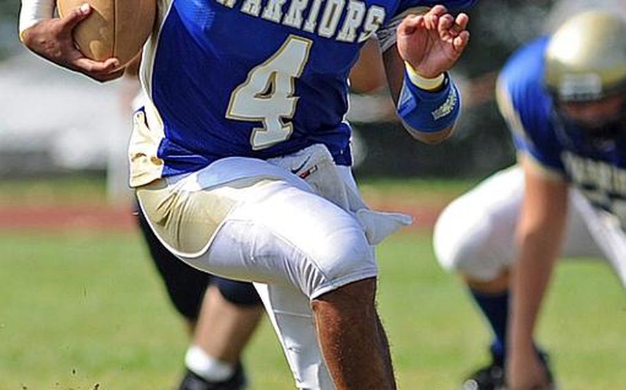 Wiesbaden senior Daniel Harris heads upfield for a big gain in a game against Heidelberg on Sept. 24.