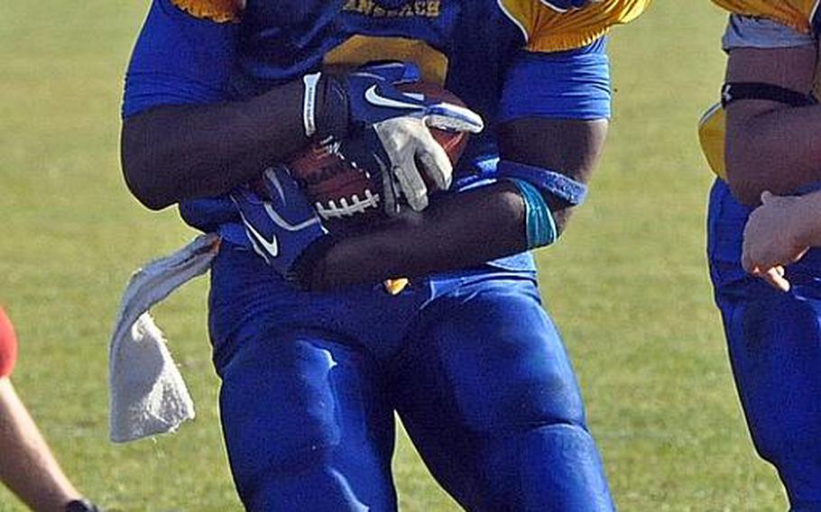 Ansbach senior running back Xavier Jones rushes downfield in a Division II semifinal against ISB on Oct. 29.