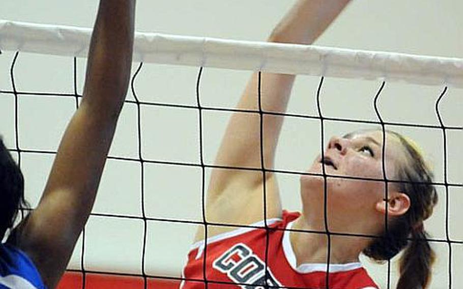 E.J. King Cobras junior middle blocker Katie Rock has helped the Cobras to No. 3 in DODDS Japan. A Far East Division II Tournament title contender would be a first for the school.