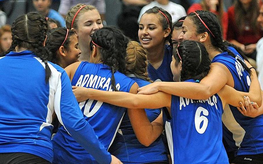 The Rota Admirals celebrate their Division III title after defeating International School of Florence 25-19, 25-13, 25-15 at the DODDS-Europe volleyball championships in Ramstein on Saturday.