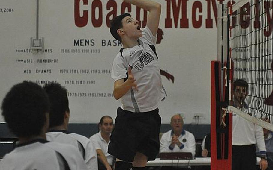 Aviano's Spencer Ridgway goes up for a spike Saturday in the third place game of the Mediterranean boys volleyball championships at Aviano Air Base, Italy. The Saints downed the American Overseas School of Rome 25-22, 25-23.