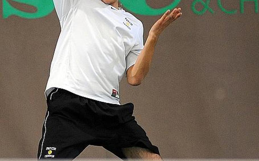 Defending champion Ajdin Tahirovic returns a ball from SHAPE's Dimitrios Stavropoulos in his 6-4, 6-3 victory in the boys single match at the DODDS-Europe tennis championships in October. Tahirovic has been named the Stars and Stripes Athlete of the Year for boys tennis for the second year in a row.