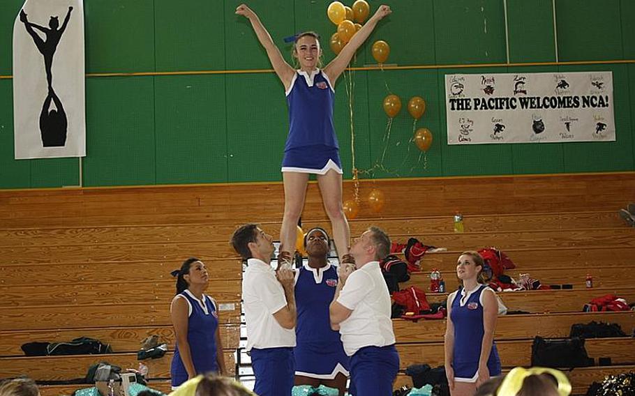 Cheerleaders from across DODDS Pacific gathered for five days of camps and competition at the 2011 Far East Cheerleading Competition at Misawa Air Base, Japan this week. Here, students practice proper lift and stunt techniques.