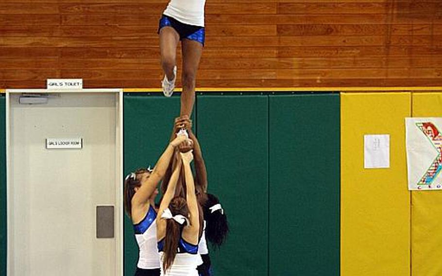 Cheerleaders from across DODDS Pacific gathered for five days of camps and competition at the 2011 Far East Cheerleading Competition at Misawa Air Base, Japan this week. Here, students practice proper lift and stunt techniques.