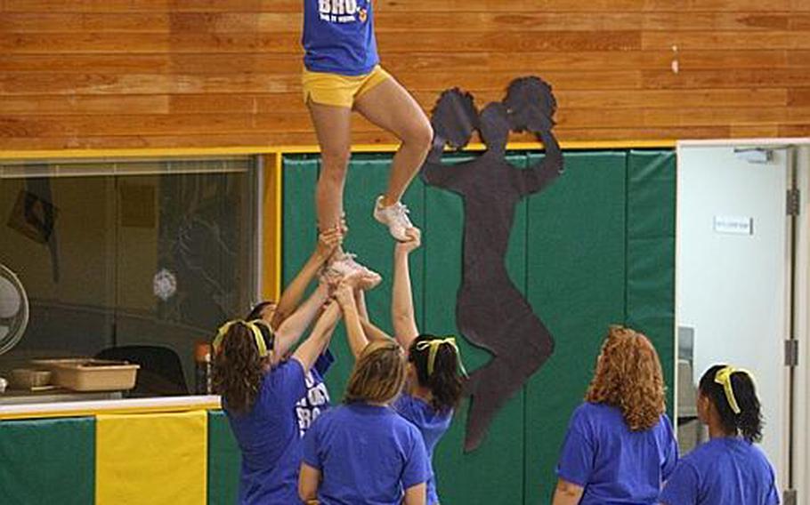 Cheerleaders from across DODDS Pacific gathered for five days of camps and competition at the 2011 Far East Cheerleading Competition at Misawa Air Base, Japan this week. Here, students practice proper lift and stunt techniques.