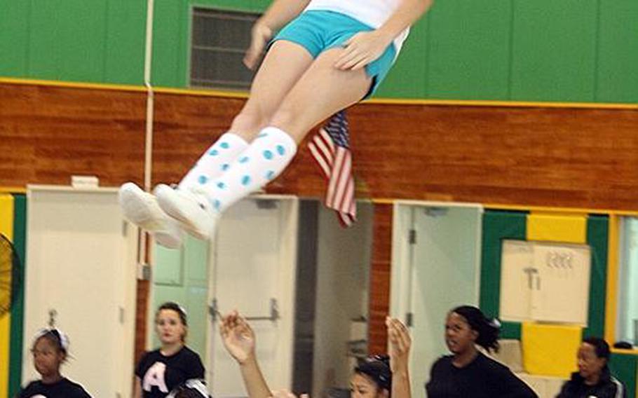 Cheerleaders from across DODDS Pacific gathered for five days of camps and competition at the 2011 Far East Cheerleading Competition at Misawa Air Base, Japan this week. Here, students practice proper lift and stunt techniques.