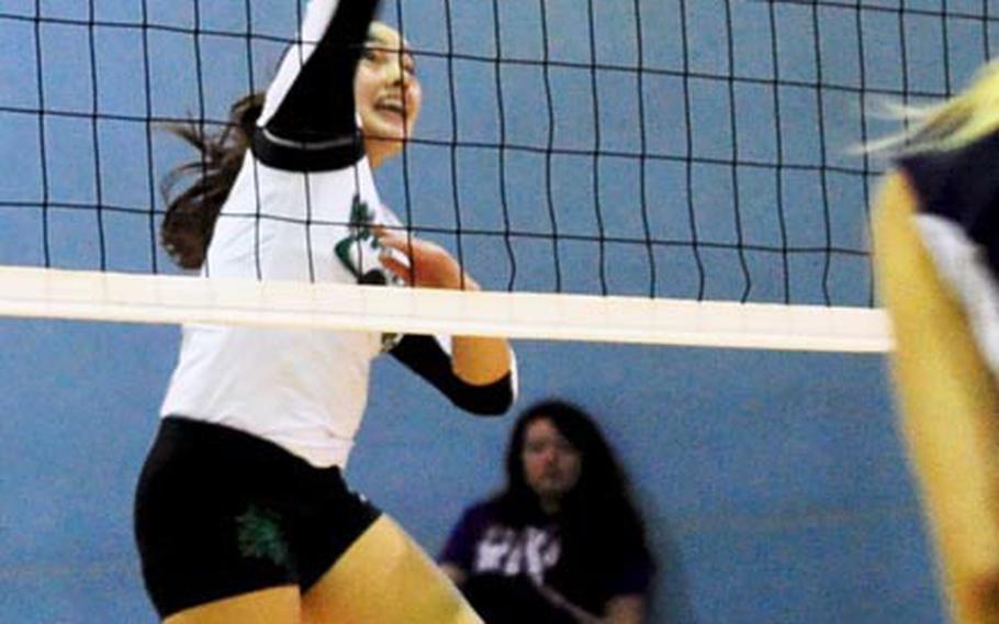 Sarah Wright of Daegu High fires away from the  backrow against Morrison Academy during Friday;s championship match in the 2011 Far East High School Girls Division II  Volleyball Tournament at Camp Walker, South Korea. Morrison won its first title since 2006 after four straight second-place finishes, beating Daegu in four sets each in a two-match final.