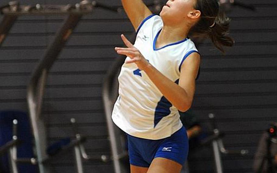 Rota's Aspen Luna has her eyes on the ball as she serves at the DODDS-Europe volleyball finals on Nov. 4. Luna has been selected as the Stars and Stripes Athlete of the Year for volleyball.