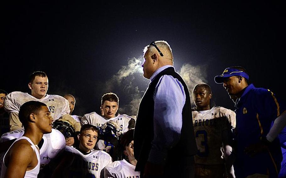 Wiesbaden head coach Steve Jewell talks to his team after winning the DODDS-Europe Division I high school football championship in Baumholder, Germany, November 5, 2011.