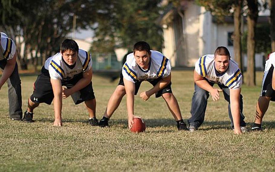 The Yokota Panthers offensive line, from left to right: right tackle Jesse Hogan, right guard Dylan Kessler, center Victor Madaris, left guard Jake Jackson and left tackle Max Lester.