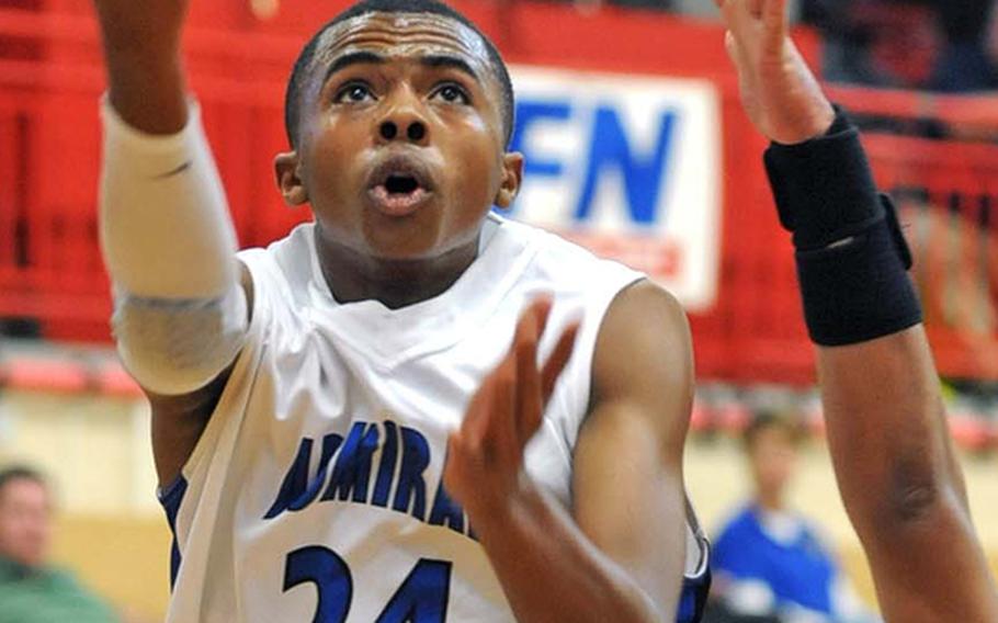 Rota's Tre'von Owens takes it to the hoop against Menwith Hill at the DODDS Europe basketball championships in February. Owens will be returning for the Division III defending champion Admirals when the DODDS-Europe 2011-12 season gets under way this weekend.