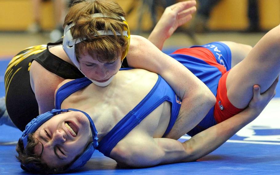 Patch's Ross Wilson, top, won the 103 pound title at last season's DODDS Europe wrestling championships, beating Ryan Goins of Ramstein. Both will be returning when the  wrestling season gets under way on Saturday.