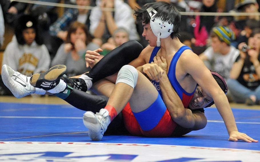 Ramstein's A.J. Franz, left, took the DODDS Europe 119-pound title last season after beating Adrian Julien of Baumholder. Franz will be returning this season for the Royals as the 2011-12 season gets under way Saturday.