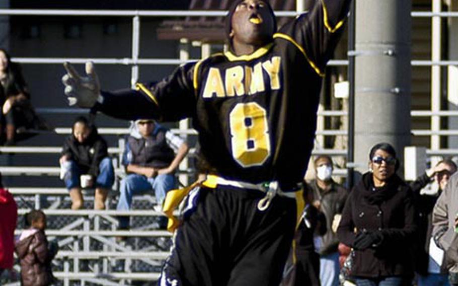 Army's Kelvin Simmons tries to intercept a Navy pass during  Saturday's 10th Japan Army-Navy flag football game at Zama American High School, Japan. Army won 19-7, its second straight win, tying the series 5-5.