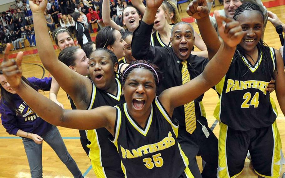 The Patch Lady Panthers celebrate their 64-52 victory over Vilseck in the DODDS Europe Division I girls basketball championship game in February. Teams wearing Panther yellow-and-black won seven of the 17 European Division I championships offered this calendar year. In cross country, baseball and softball, Patch athletes completed the gender-double, winning both the boys' and girls' titles in each. Patch also topped girls' basketball and soccer, wrestling and boys' singles tennis.