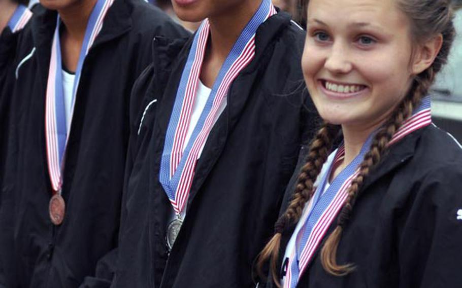 Patch runners (from right to left) Baileigh Sessions, Morgan Mahlock and Julia Lockridge took the top three medals among the girls at the 2011 European cross country championships in Schwetzingen, Germany, in October. 