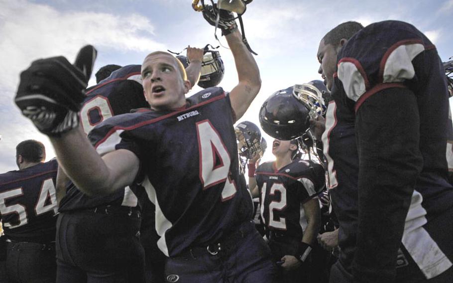 Bitburg players celebrate after winning their third consecutiveDivision II championship against Ansbach by a score of 39-18.