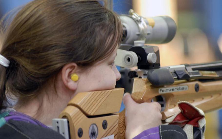 Heidelberg senior Katelyn Bronell takes aim at the 2011 DODDS-Europe marksmanship championships at Baumholder High School in January.  Bronell led all shooters with 281 points.