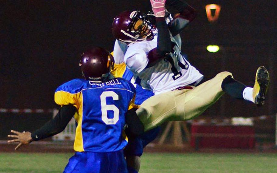 Ben McDaniels of the Nouth All Star Squad makes an athletic attempt to pull down a pass in the DODDS-Europe high school football all star game in November.