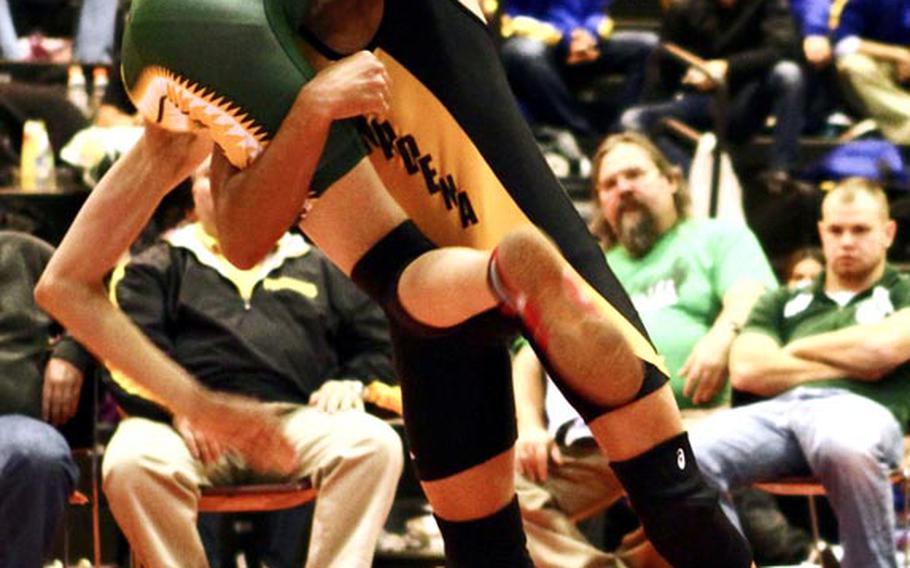 Kadena's Justin Duenas, right, lifts Francis Estacion of Robert D. Edgren for an overhead throw during Saturday's 101-pound championship bout in the 2012 Nile C. Kinnick Invitational "Beast of the Far East" Wrestling Tournament in Japan. Duenas beat Estacion by superior decision 2-0 (6-0, 6-0).