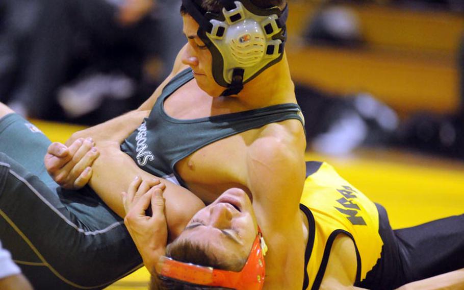 Kubasaki 108-pounder and reigning Far East Tournament weight-class champion Steven Walter gets the upper hand on Kadena's David Hernandez during a dual meet this season. Walter is one of four returning champions from last year's Far East Division I Tournament and is undefeated so far this season.