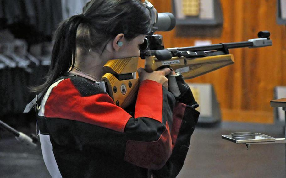 Kathleen Waldron, a senior from Hohenfels, takes aim Saturday in Ansbach, Germany. Waldron finished with 276 points and helped Hohenfels to a first-place finish.