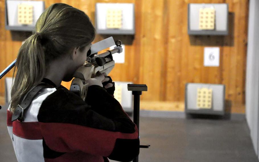 Malia Carson, a junior from Vilseck, Germany, takes aim Saturday in Ansbach, Germany. Caron finished with 270 points. Vilseck finished third overall.