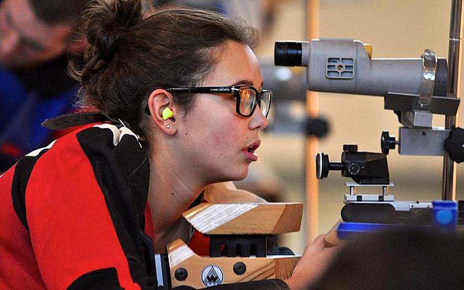 Patch's Madeline Hershberger checks her targets during a home rifle team meet on Dec. 3. Hershberger shot a 274.