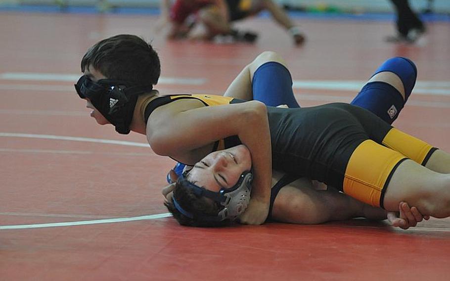 Although Vicenza seventh-grader Peter McCollaum couldn't see after his head gear slipped Saturday, he still managed to pin Black Forest Academy eighth-grader Jeffery Maier in a meet involving four schools Saturday at Aviano Air Base, Italy.