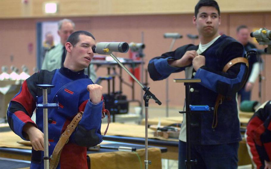Participants in Saturday's DODDS-Europe marksmanship finals adjust gear and prepare for the next firing position. Patchwon its third title in four years at the event, held in Vilseck.