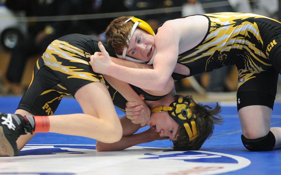 Ross Wilson of Patch, right, beat his teammate John Kellett-Forsyth for the 113-pound  title at the DODDS-Europe wrestling championships in Wiesbaden, Saturday.