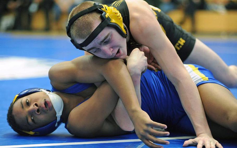 Patch's Isaac McIlvene, top, took the 120-pound  title at the DODDS-Europe wrestling championships in Wiesbaden, Saturday, beating Wiesbaden's Dante Thomas.