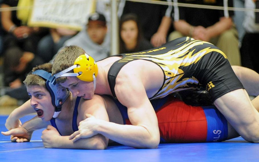Patch's Calen Fields, top, defeated Ramstein's Matt Sharpy for the 170-pound  title at the DODDS-Europe wrestling championships in Wiesbaden, Saturday.