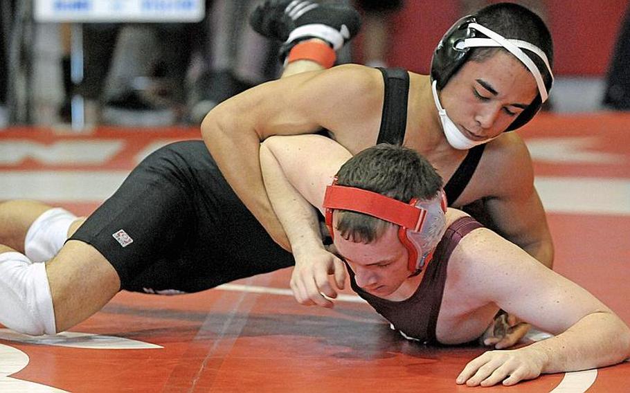 Zama American Trojans junior 141-pound wrestler Chad Wilder, going up against R.J. Traylor of Matthew C. Perry in the Nile C. Kinnick Invitational "Beast of the Far East" tournament, went 35-1 overall this season with four titles and one second in five tournaments after transferring from American Heritage in south Florida. He lived up to his billing as "the next one," the logical successor to Zama's three-time Far East champion Michael Spencer, by winning at 141 pounds, being named the tournament's Outstanding Wrestler as well as Stars and Stripes Pacific high school Wrestler of the Year.