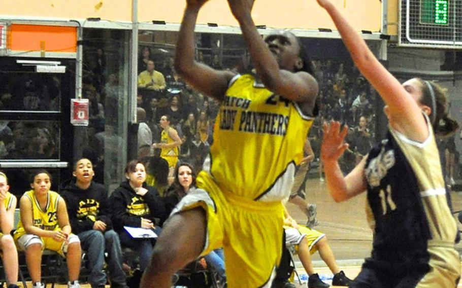 Janelle Loney lays up two points during the final regular-season game against Heidelberg last month. Loney has been selected as the Stars and Stripes girls basketball player of the year for the second consecutive year.